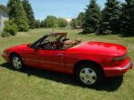 red 1990 buick reatta convertible