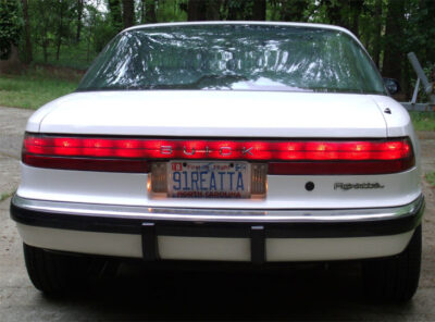 1991 white buick reatta personalized license plate